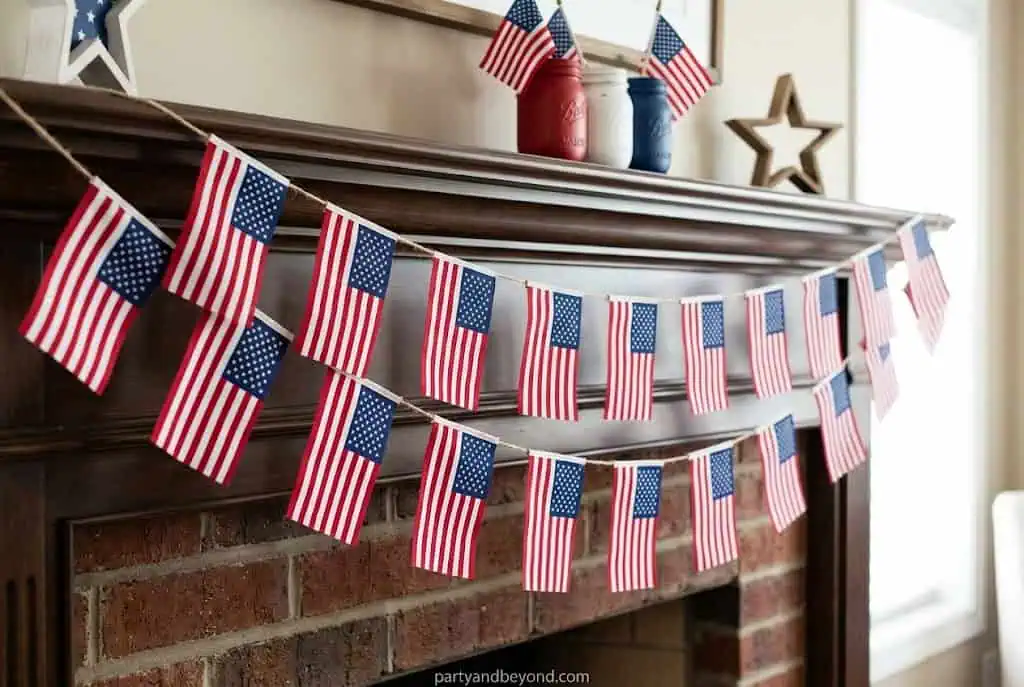Dollar store American flag garland draped across porch railing for Independence Day