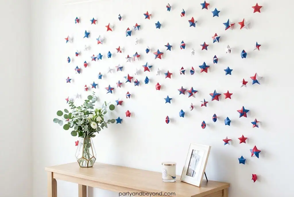 Hanging paper star backdrop with patriotic colors for Independence Day party