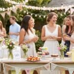 Amazing Bridal Shower on a Budget Under $450: Complete 2026 Guide You’ll Love Outdoor bridal shower with women enjoying drinks and desserts.