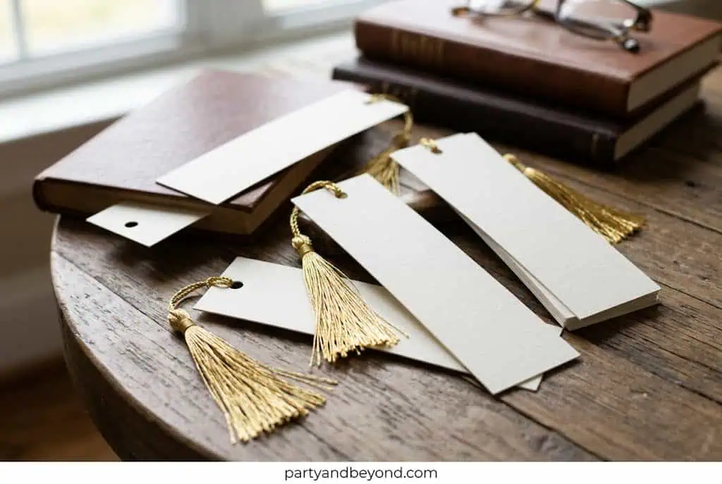 Elegant gift tags with gold tassels for party decorations and gift wrapping.
