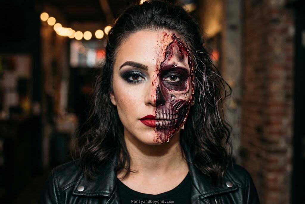 Half glam half gore Halloween makeup showing beauty makeup blended with exposed skin SFX effect