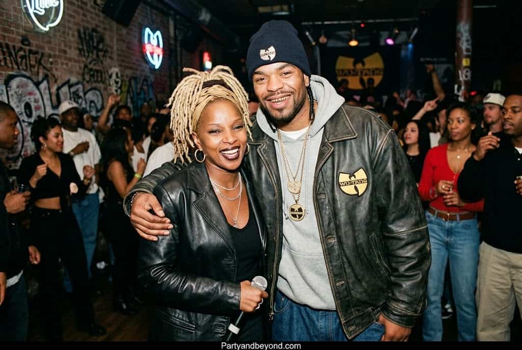 Black couple dressed in oversized denim and Wu-Tang-inspired streetwear for Halloween.