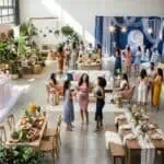 20 Best Baby Shower Themes for 2026 (Trending Ideas & Decor) Elegant event setup with colorful decorations and floral arrangements.