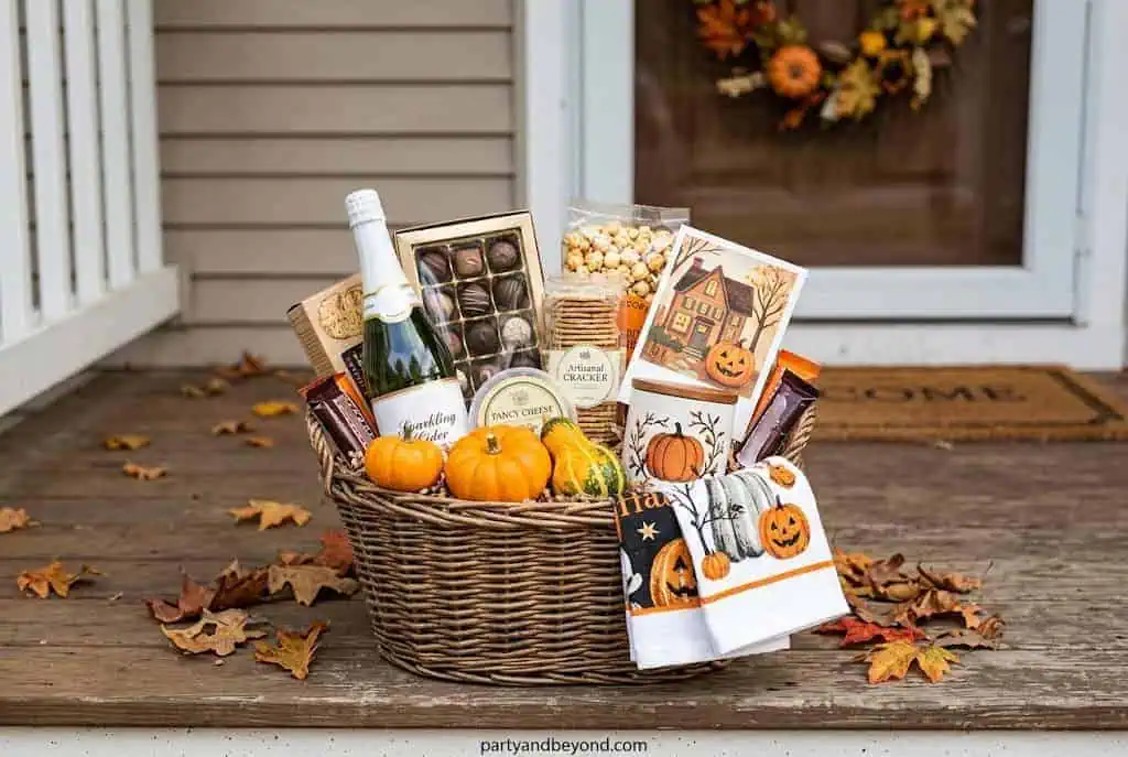 Welcome boo basket with bakery treats, candle, cocoa, pumpkin, and neighborhood welcome card