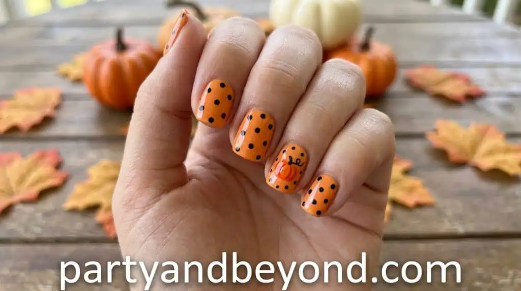 Orange polka dots transformed into mini pumpkins using simple detailing like stems and eyes. A quick and beginner-friendly design.