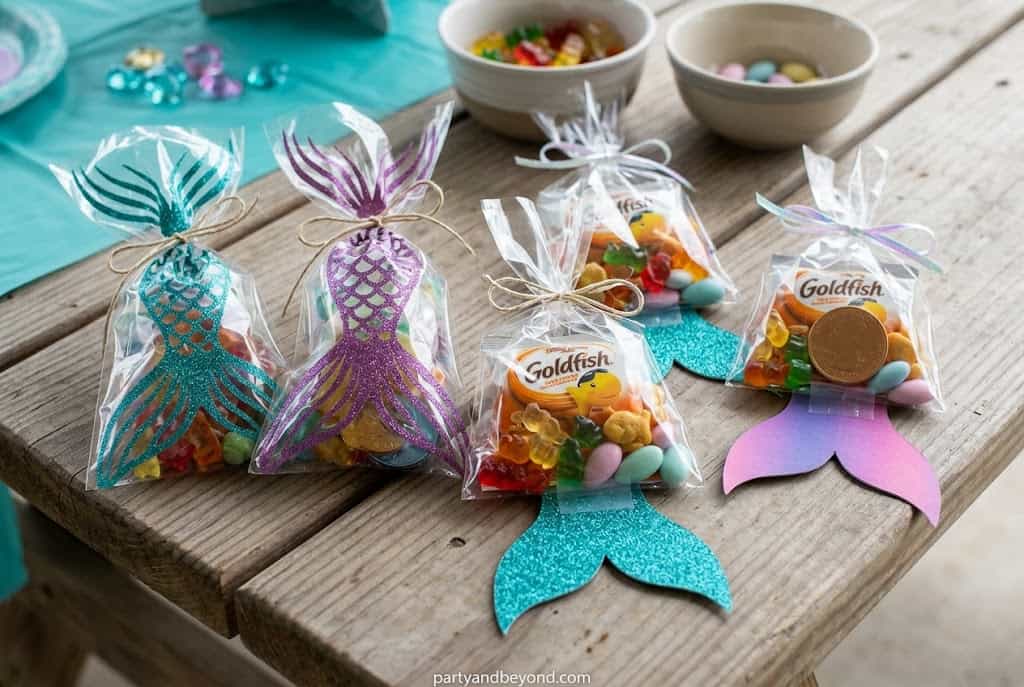 Mermaid-themed party favor bags filled with ocean-inspired gifts and treats.